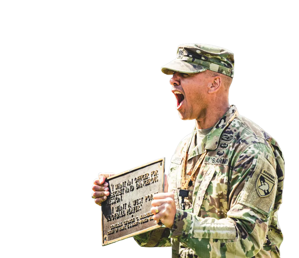 Soldier holding plaque